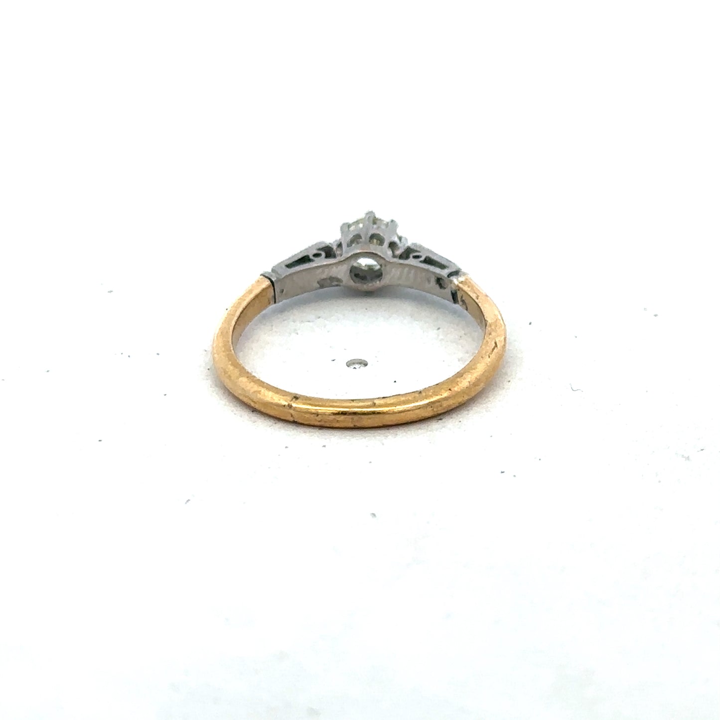 18ct yellow gold diamond ring by Reeves and Sons, size O, featuring sparkling diamonds set in a classic band style.