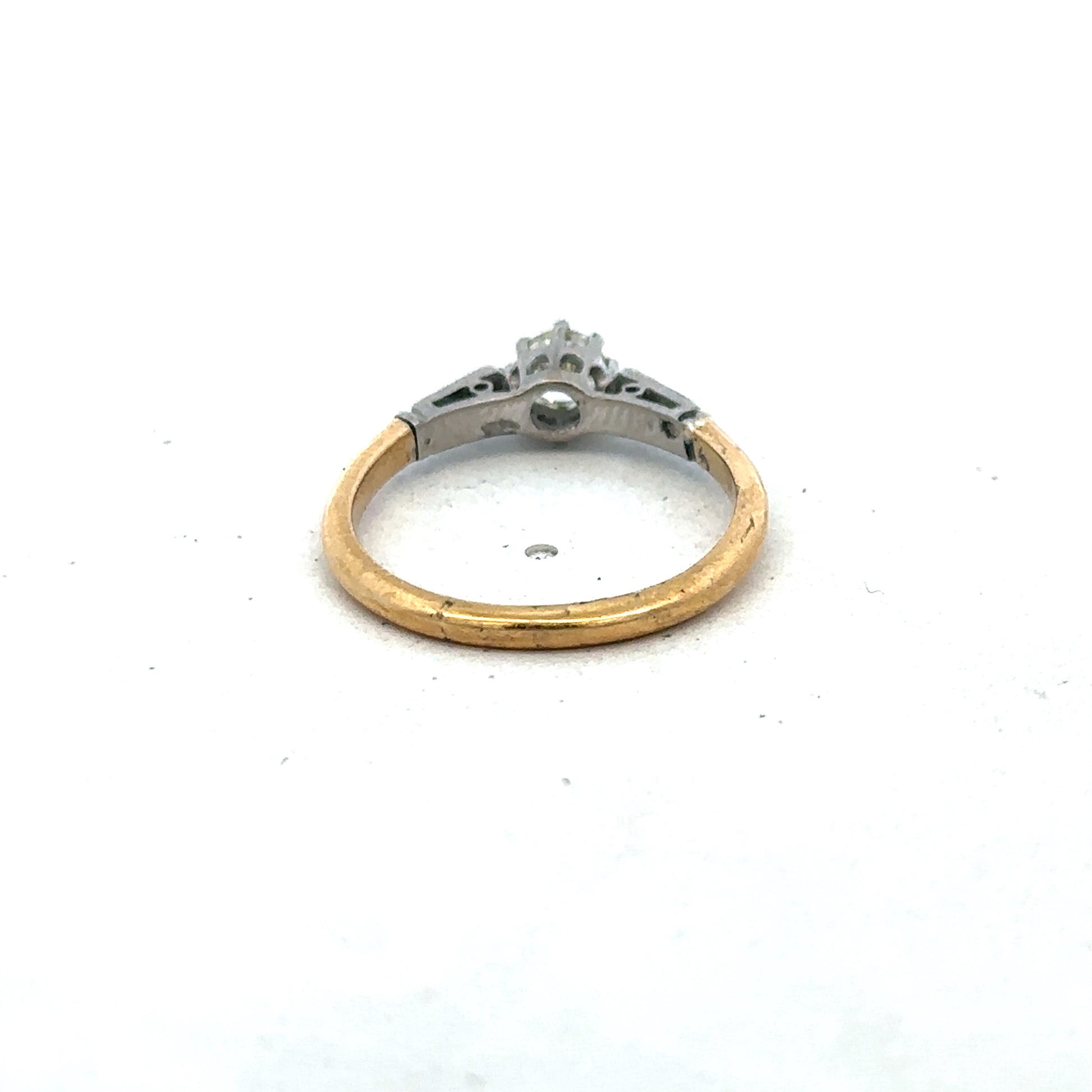 18ct yellow gold diamond ring by Reeves and Sons, size O, featuring sparkling diamonds set in a classic band style.