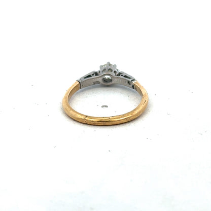 18ct yellow gold diamond ring by Reeves and Sons, size O, featuring sparkling diamonds set in a classic band style.