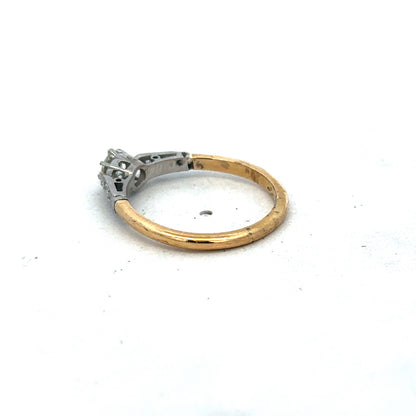 18ct yellow gold diamond ring size O by Reeves and Sons, featuring a sparkling diamond centerpiece.