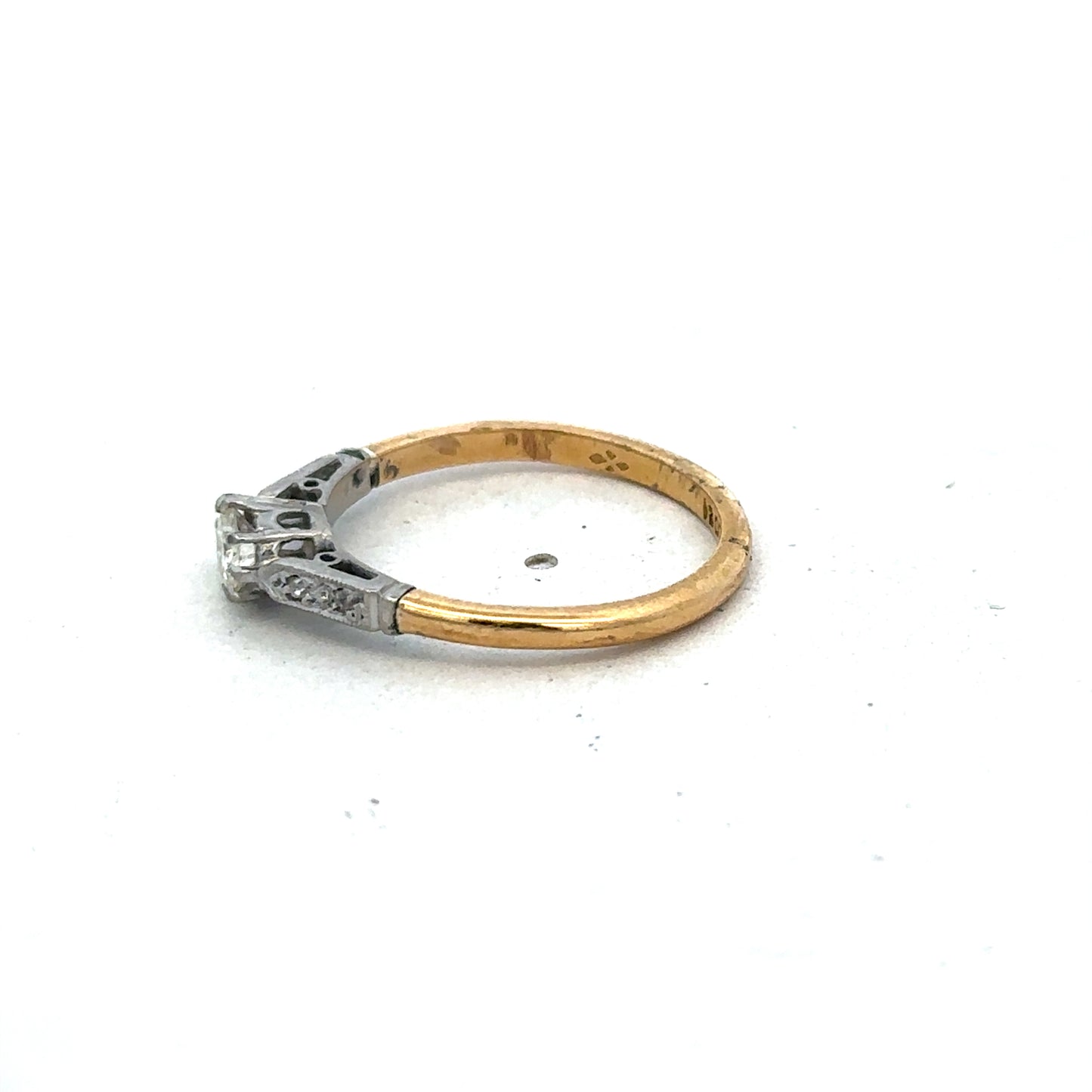 18ct yellow gold diamond ring in size O by Reeves and Sons, featuring a sparkling diamond centerpiece.