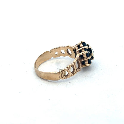 9ct yellow gold sapphire and diamond ring in size M, featuring a central sapphire gemstone with diamond accents, by Reeves and Sons.