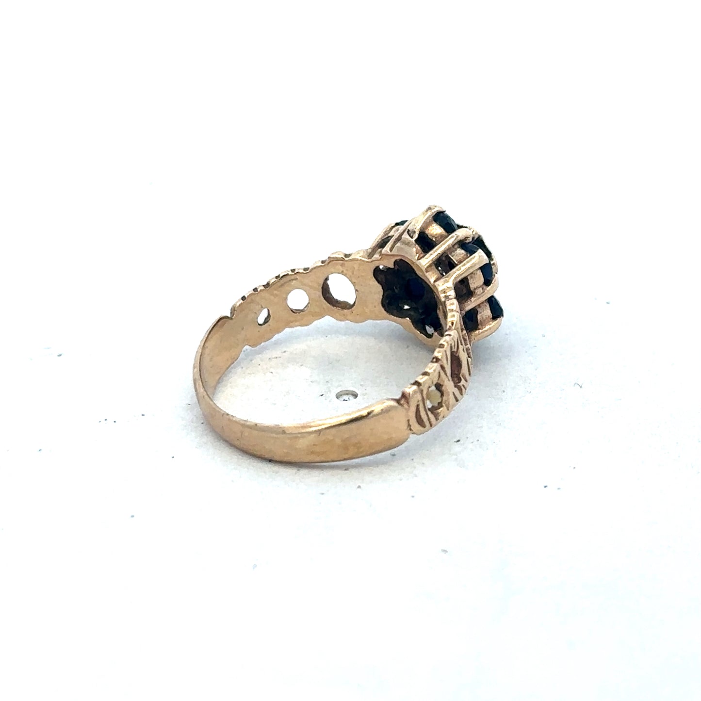 9ct yellow gold sapphire and diamond ring, size M, featuring a central sapphire with diamond accents, designed by Reeves and Sons.
