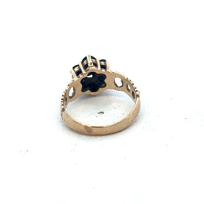 9ct yellow gold sapphire and diamond ring, size M, featuring a central sapphire with diamond accents, Reeves and Sons jewelry