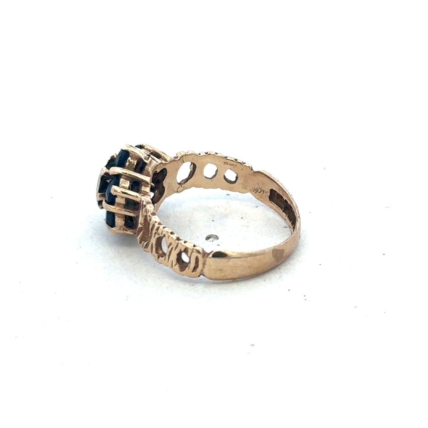 9ct yellow gold sapphire and diamond ring, size M, featuring a central sapphire and sparkling diamonds, by Reeves and Sons.