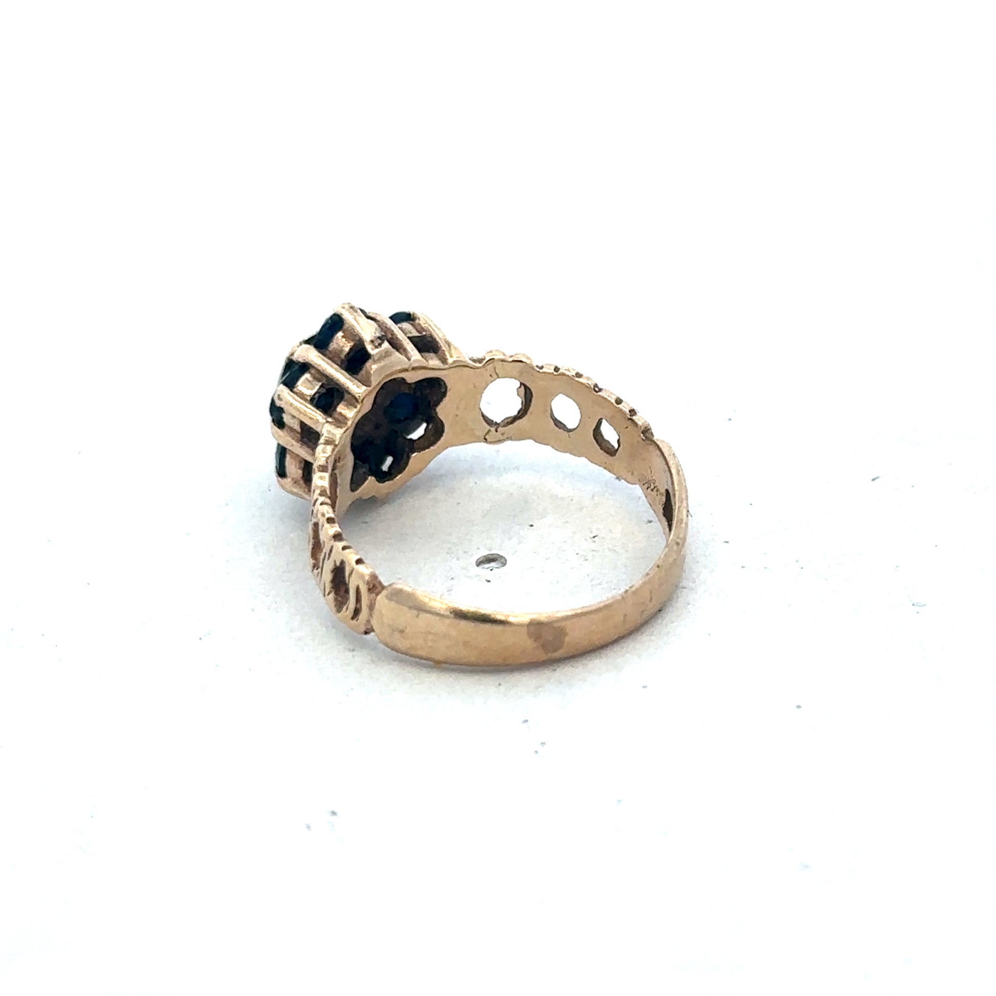9ct yellow gold sapphire and diamond ring, size M, featuring a central sapphire stone and diamond accents, by Reeves and Sons.