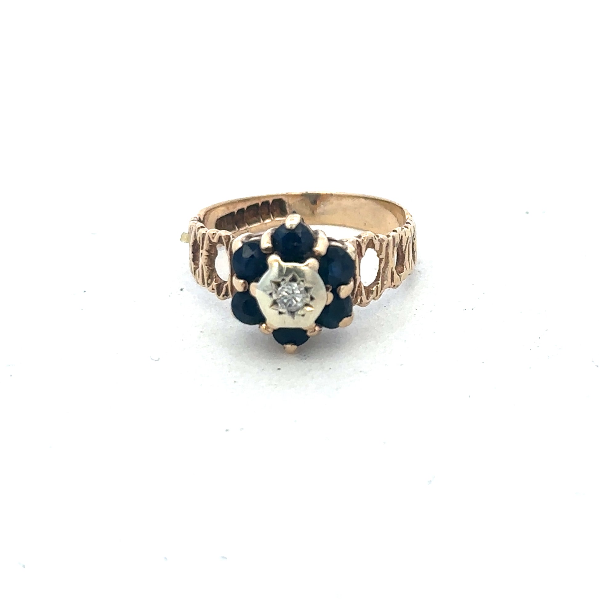 9ct yellow gold sapphire and diamond ring in size M by Reeves and Sons, featuring a detailed gemstone design.