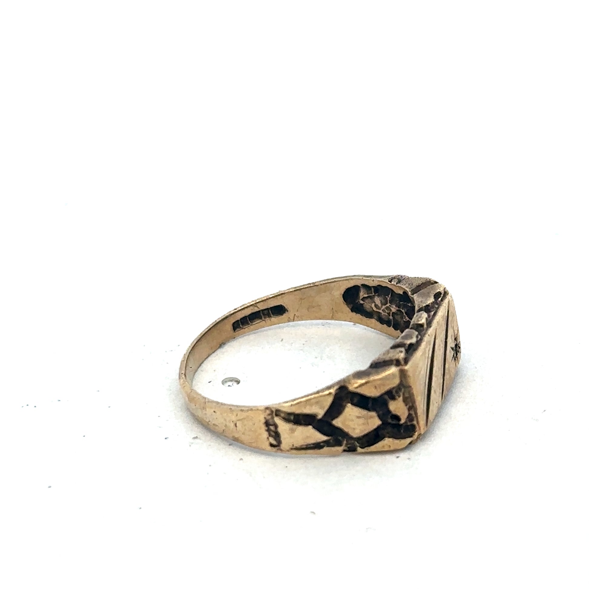 9ct yellow gold diamond signet ring in size S1/2, featuring a polished surface and engraved design, by Reeves and Sons.