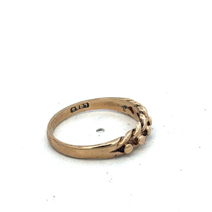9ct yellow gold keeper ring size K by Reeves and Sons, close-up of smooth gold band with subtle shine