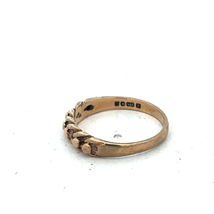 9ct yellow gold keeper ring in size K with a polished finish, designed by Reeves and Sons.