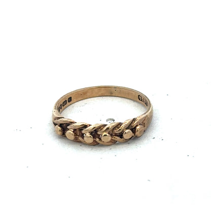 9ct yellow gold keeper ring in size K by Reeves and Sons, featuring a smooth polished band and classic design.