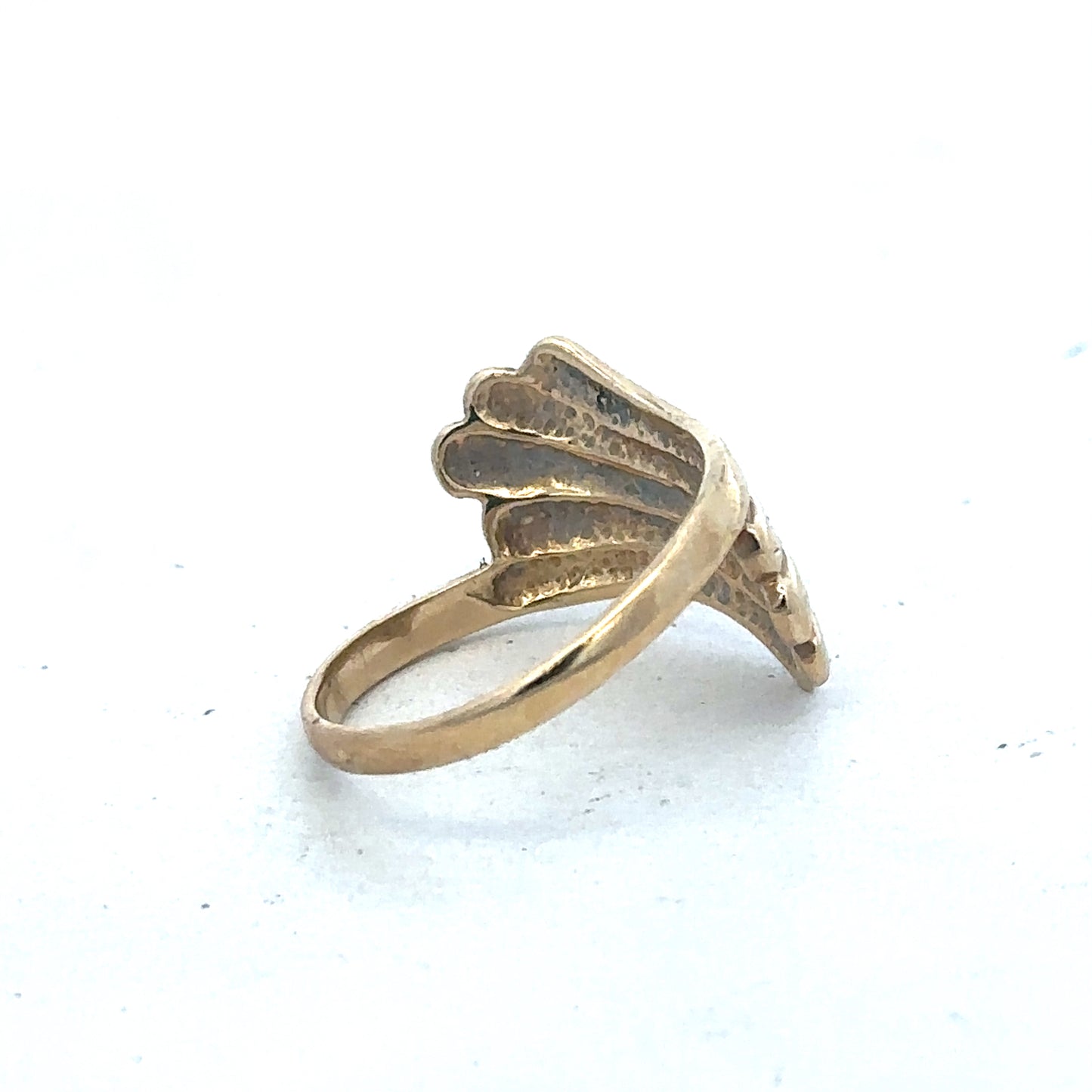 9ct yellow gold ring in size N1/2 with a smooth band, crafted by Reeves and Sons, shown in close-up detail.