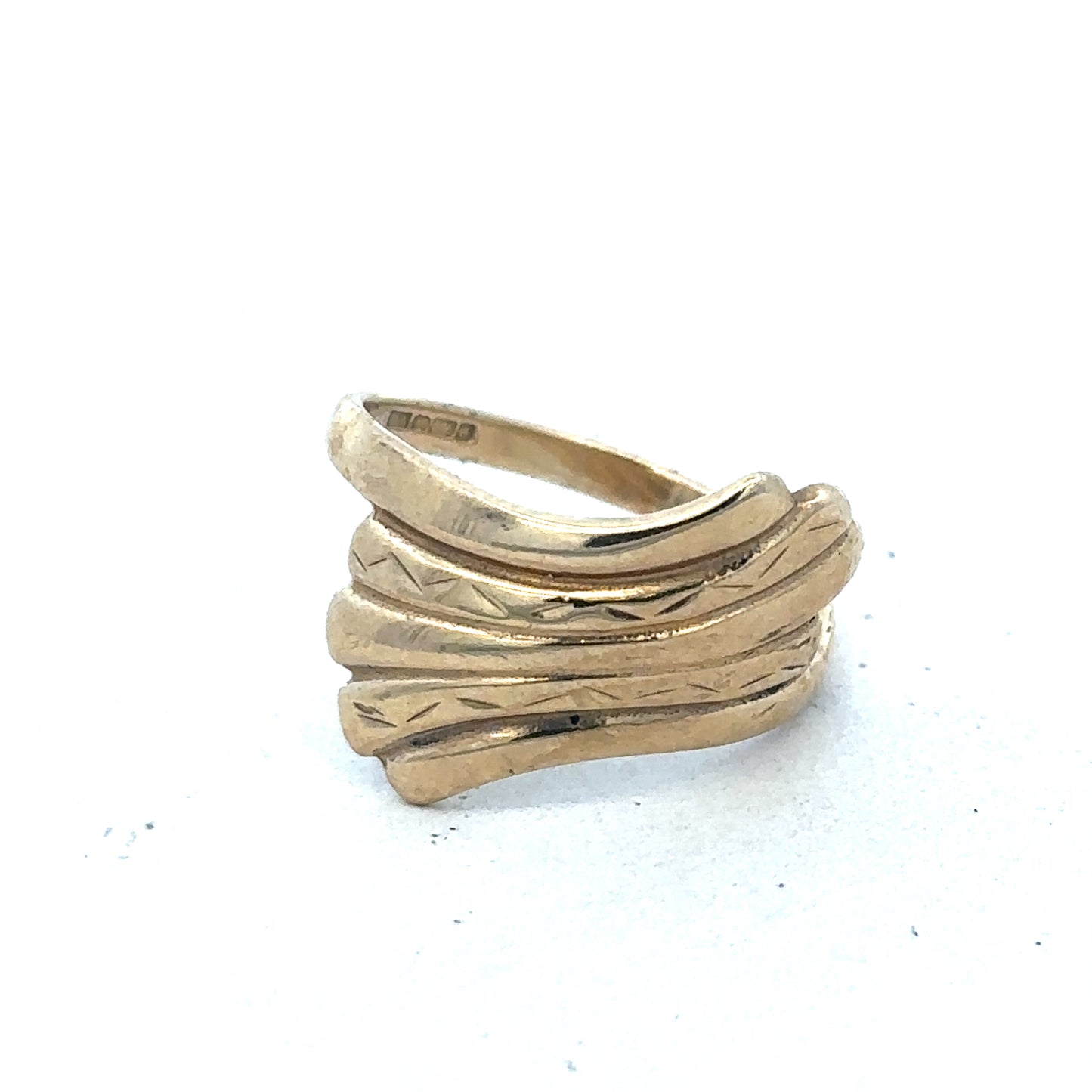 9ct yellow gold ring size N1/2 from Reeves and Sons, featuring a polished band and elegant design, visible in the image.