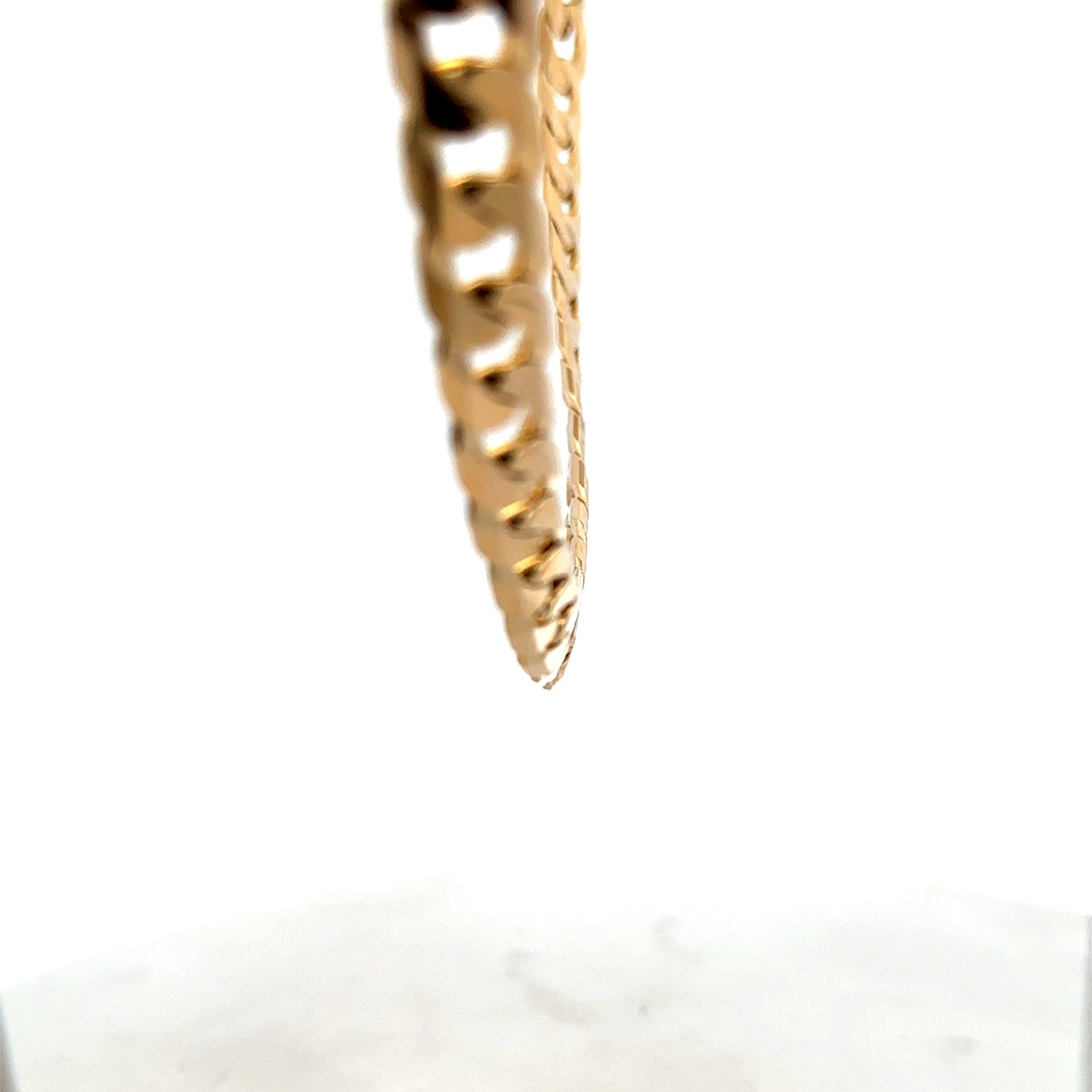 9ct yellow gold curb chain weighing 60.2g, crafted by Reeves and Sons, displayed lying flat against a neutral background.