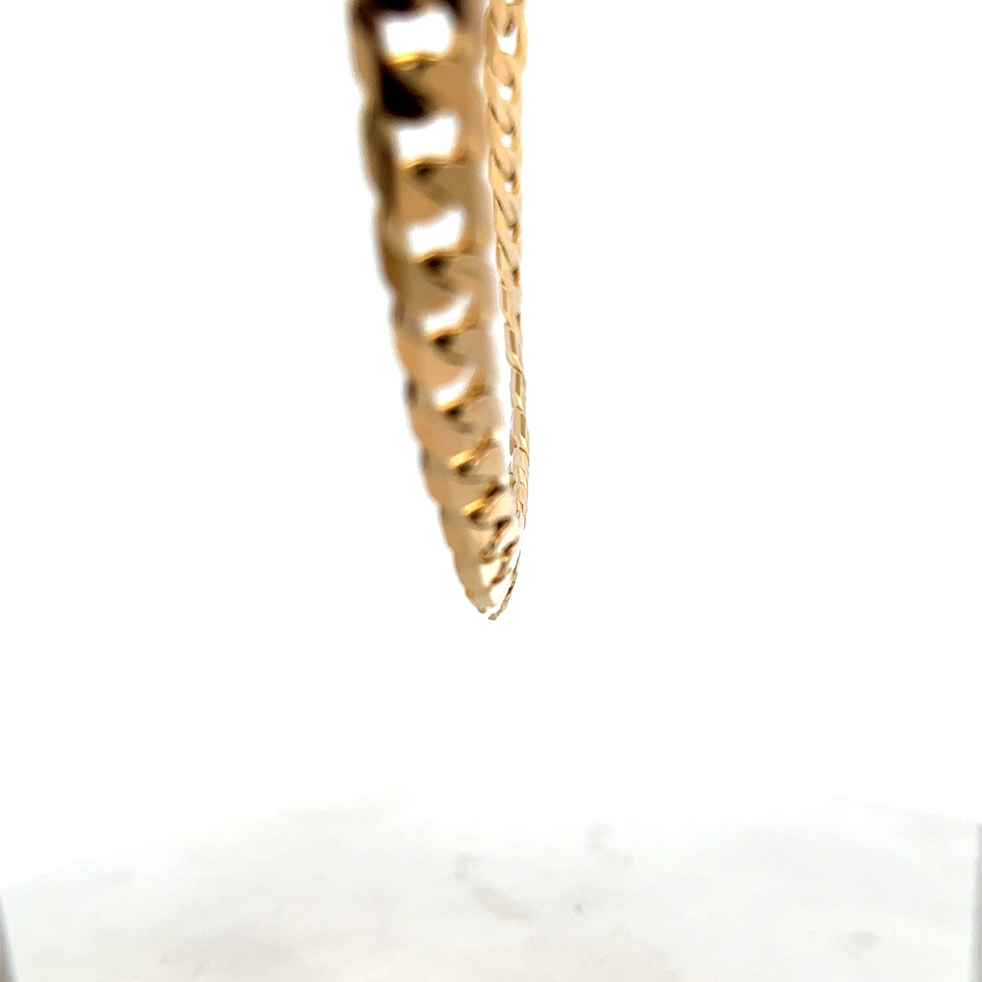 9ct yellow gold curb chain weighing 60.2g, crafted by Reeves and Sons, displayed lying flat against a neutral background.