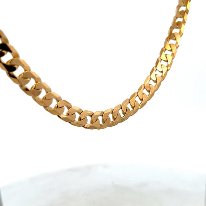 Reeves and Sons 9ct yellow gold curb chain weighing 60.2g, showcasing a thick, polished gold jewelry chain on a white background.