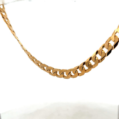 9ct yellow gold curb chain weighing 60.2g, crafted by Reeves and Sons, with a close-up view of the chain links.