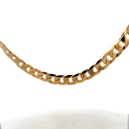 9ct yellow gold curb chain weighing 60.2g, featuring classic interlinked design, crafted by Reeves and Sons.