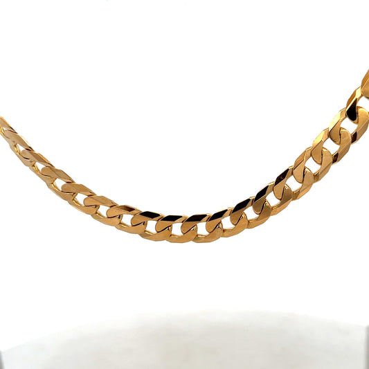 9ct yellow gold curb chain weighing 60.2g, featuring classic interlinked design, crafted by Reeves and Sons.