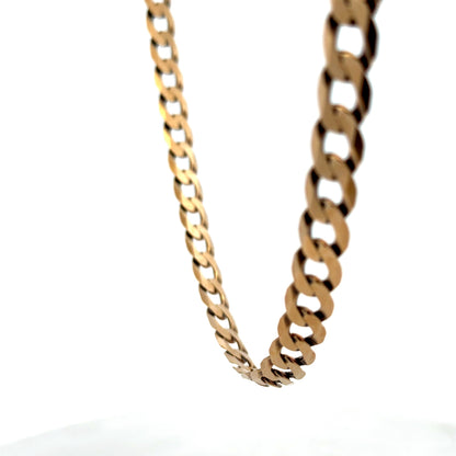 9ct yellow gold curb chain weighing 30.1g with Reeves and Sons branding, displayed with a close-up of the chain links.
