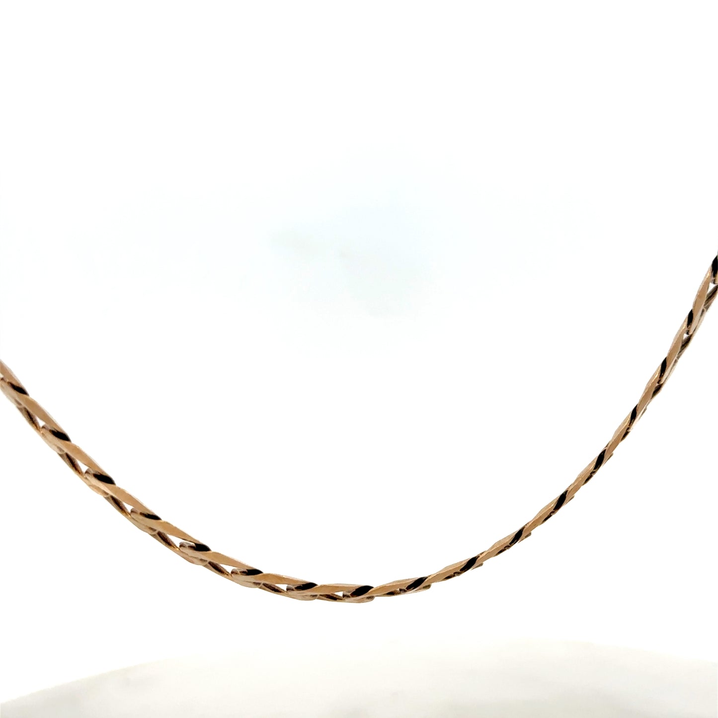 9ct yellow gold curb chain weighing 30.1g, from Reeves and Sons, showing detailed close-up of the sturdy chain links.