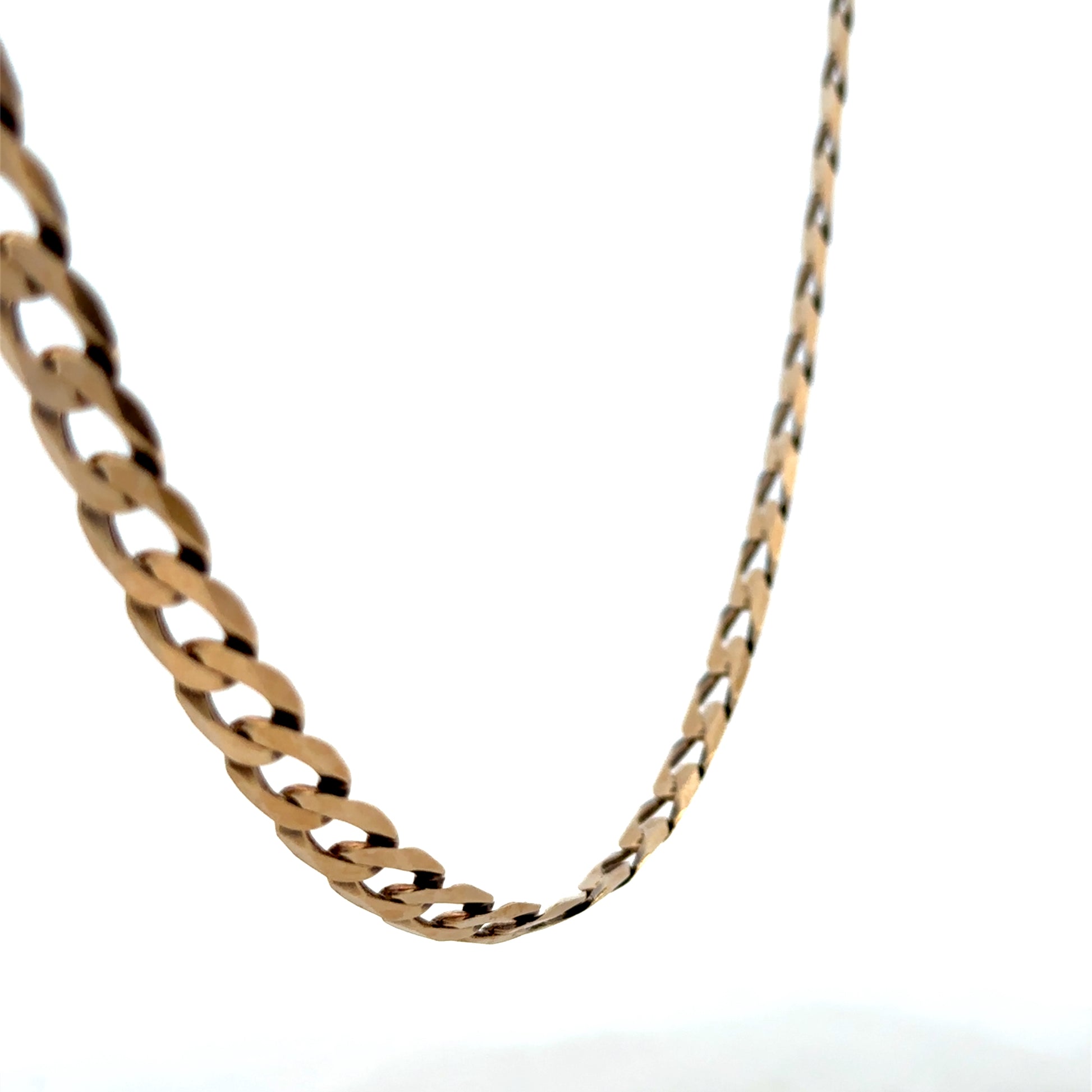 9ct yellow gold curb chain weighing 30.1g, from Reeves and Sons, with detailed links visible in a close-up image.