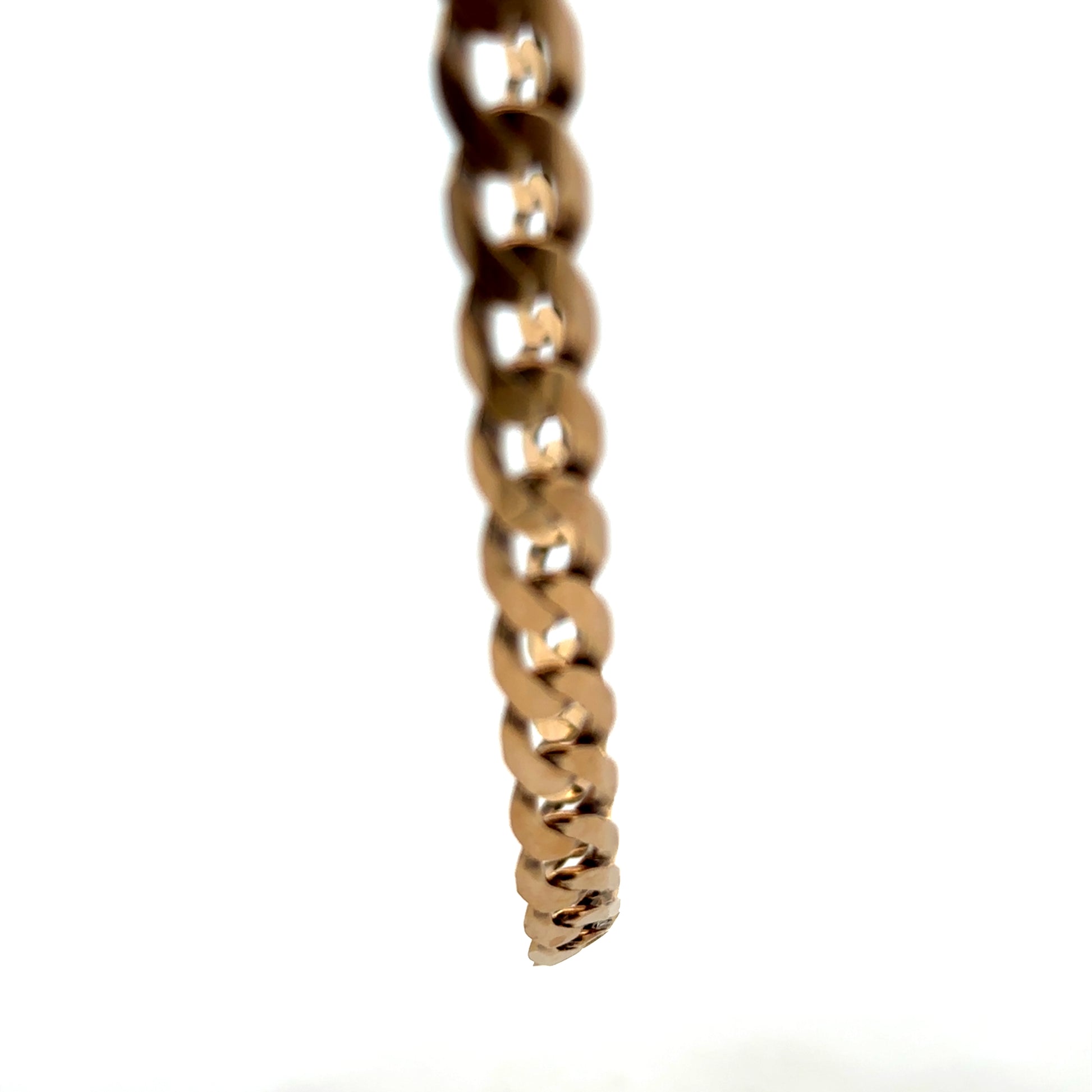 9ct yellow gold curb chain weighing 30.1g with a classic design, shown in a Reeves and Sons product image.