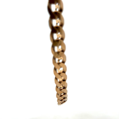 9ct yellow gold curb chain weighing 30.1g with a classic design, shown in a Reeves and Sons product image.