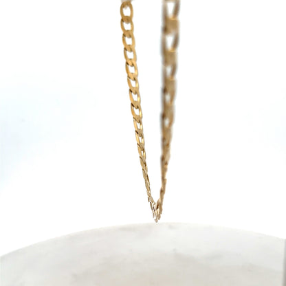 9ct yellow gold curb chain weighing 27.7g with a classic linked design, crafted by Reeves and Sons.