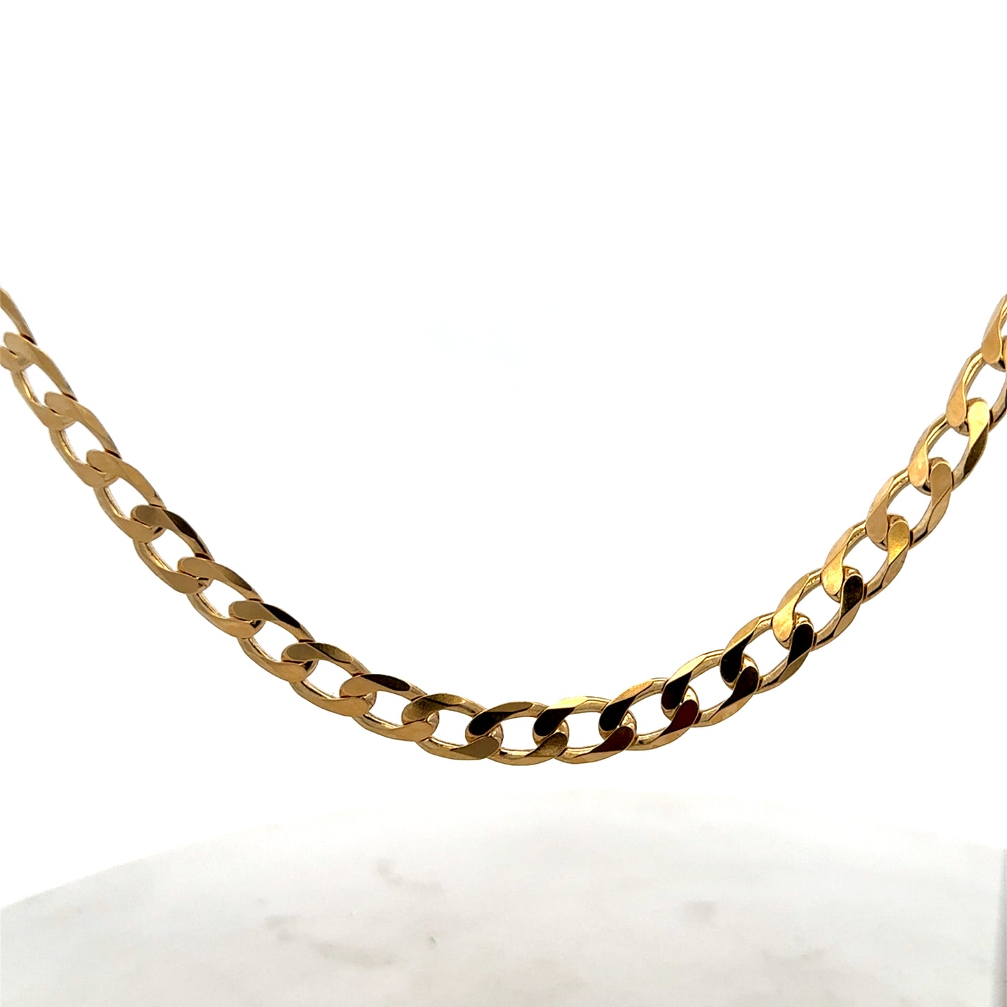 9ct yellow gold curb chain weighing 27.7g, featuring a classic linked design by Reeves and Sons.