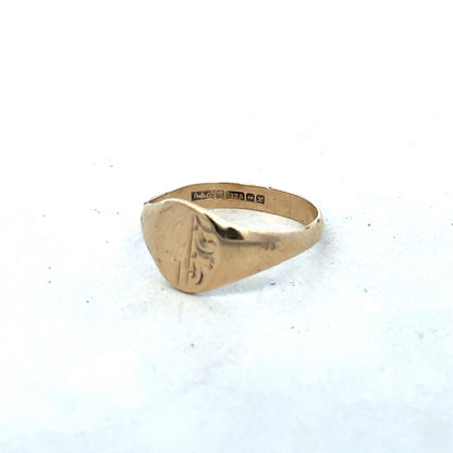 9ct yellow gold signet ring in size M with a polished finish, crafted by Reeves and Sons.