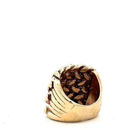9ct yellow gold keeper ring size P1/2 by Reeves and Sons, close-up of polished gold band with engraved details.