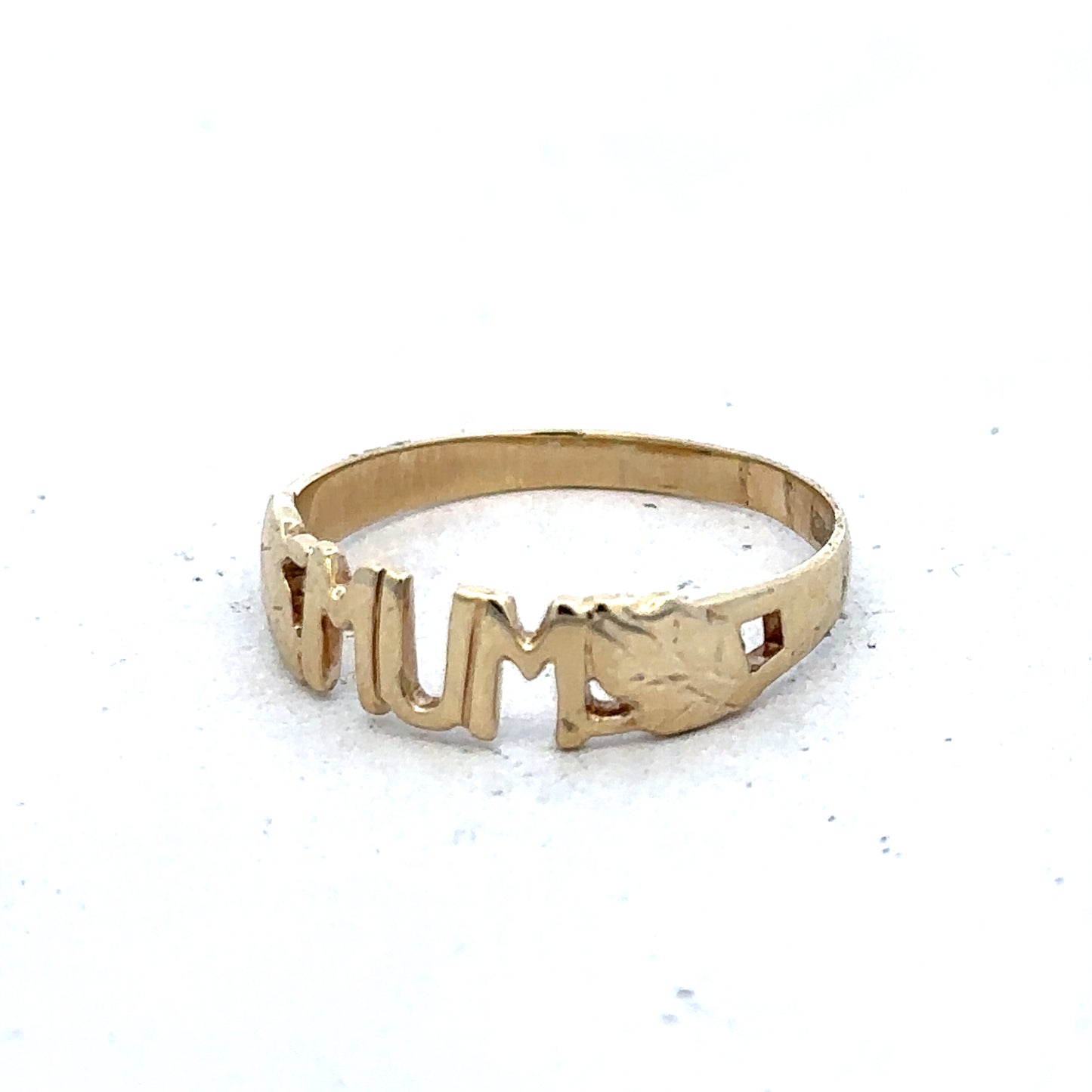 9ct yellow gold MUM ring in size O by Reeves and Sons, featuring a polished gold band with engraved lettering.