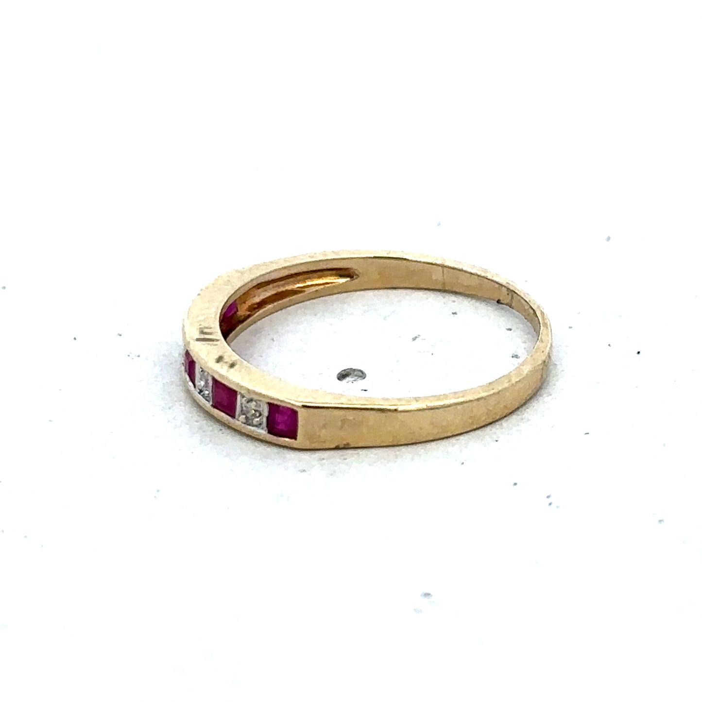 9ct yellow gold ruby and diamond ring, size K1/2, featuring sparkling gemstones and intricate design, by Reeves and Sons.