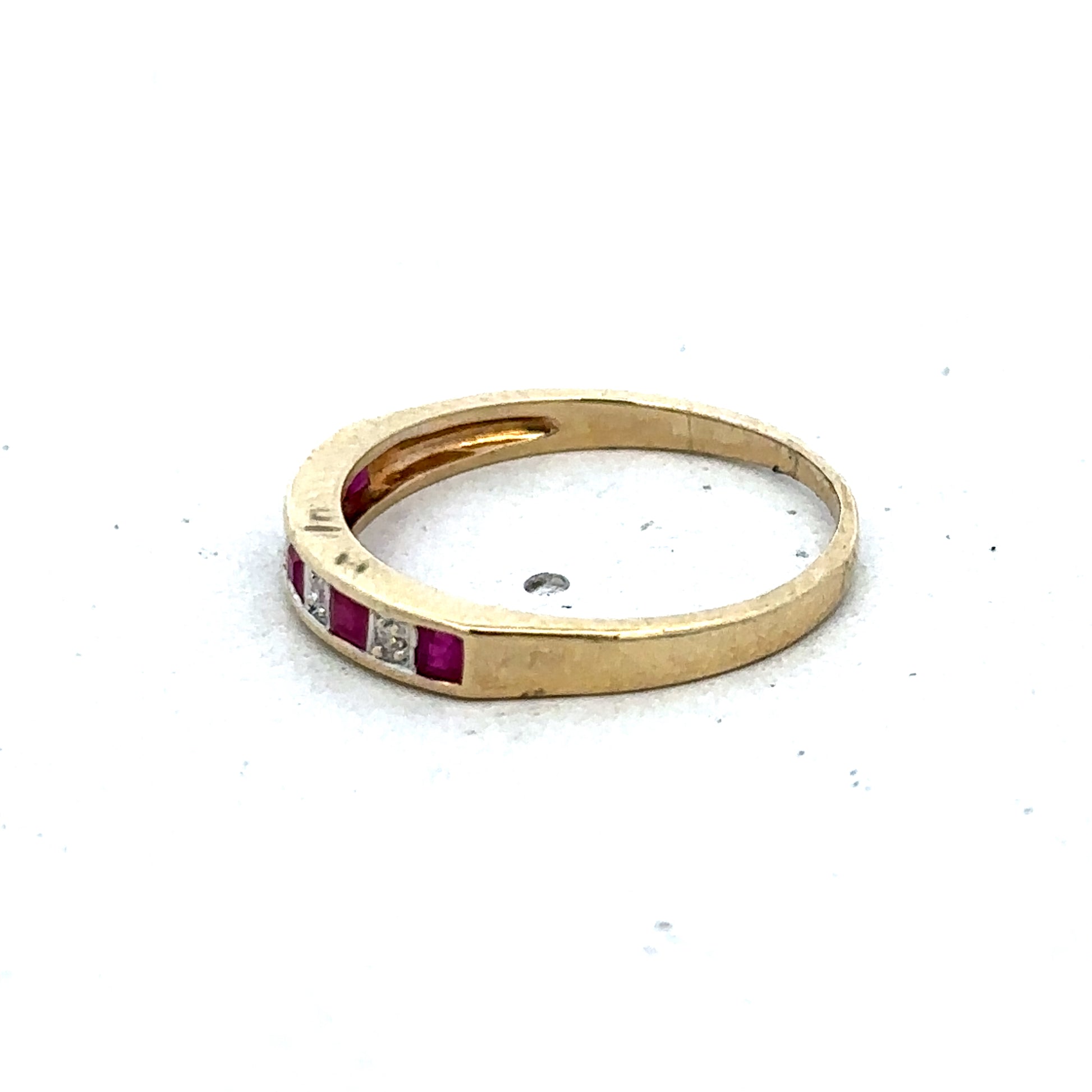 9ct yellow gold ruby and diamond ring, size K1/2, featuring sparkling gemstones and intricate design, by Reeves and Sons.