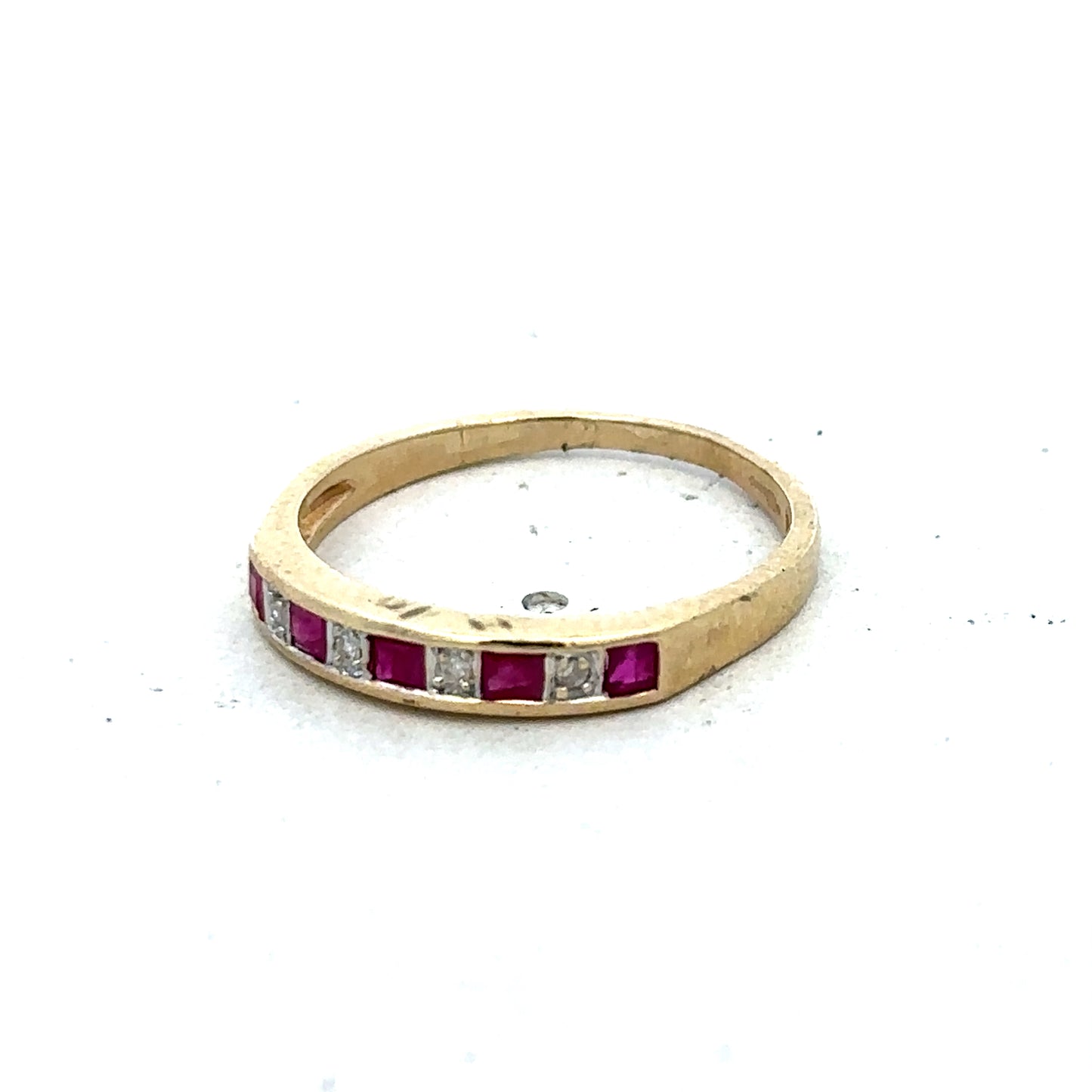 9ct yellow gold ruby and diamond ring, size K1/2, featuring a vibrant ruby and sparkling diamonds, crafted by Reeves and Sons.