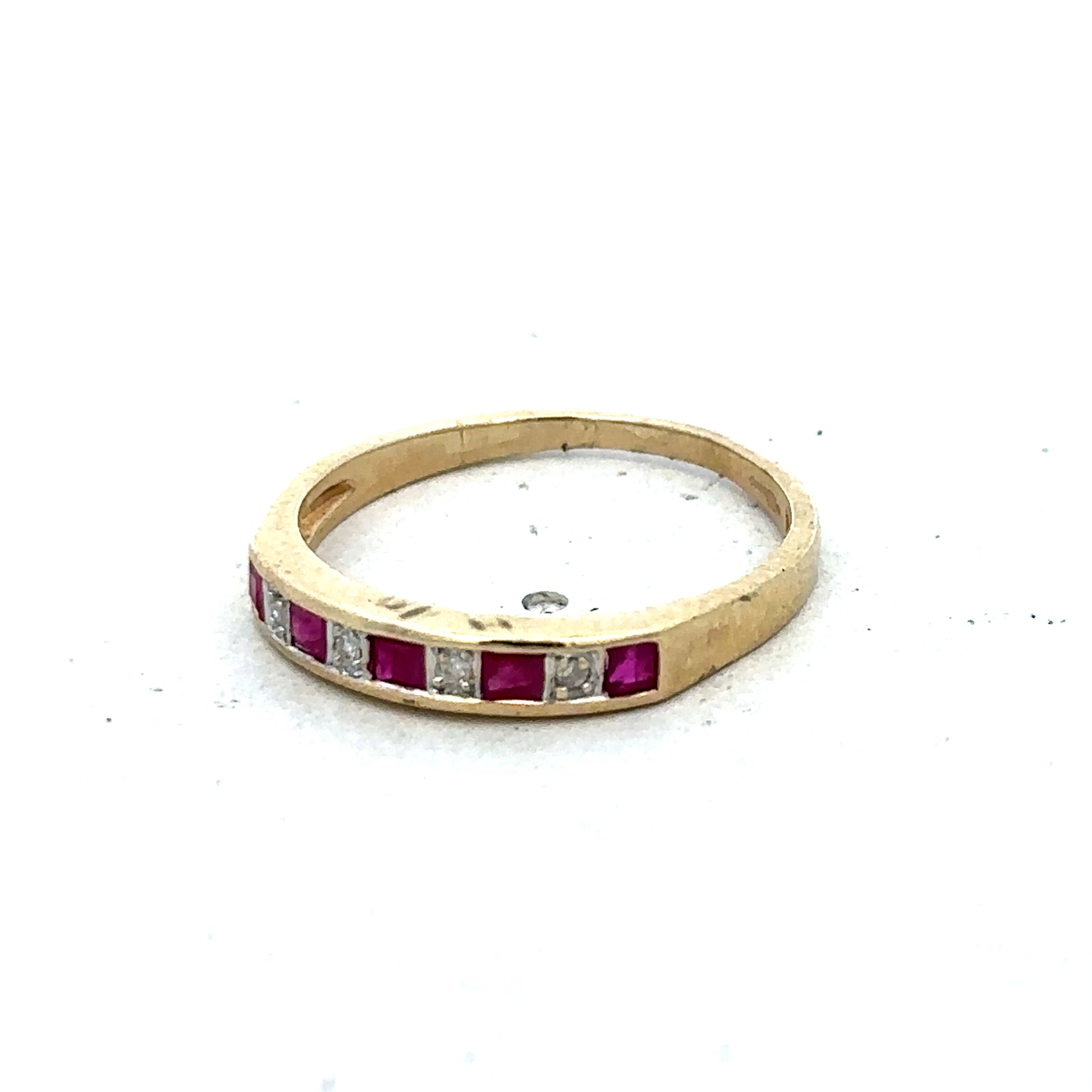 9ct yellow gold ruby and diamond ring, size K1/2, featuring a vibrant ruby and sparkling diamonds, crafted by Reeves and Sons.