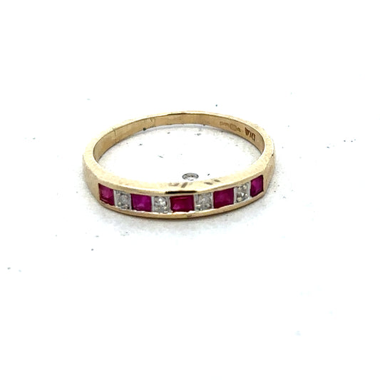 9ct yellow gold ruby and diamond ring, size K1/2, featuring a sparkling central ruby and diamond accents, by Reeves and Sons.