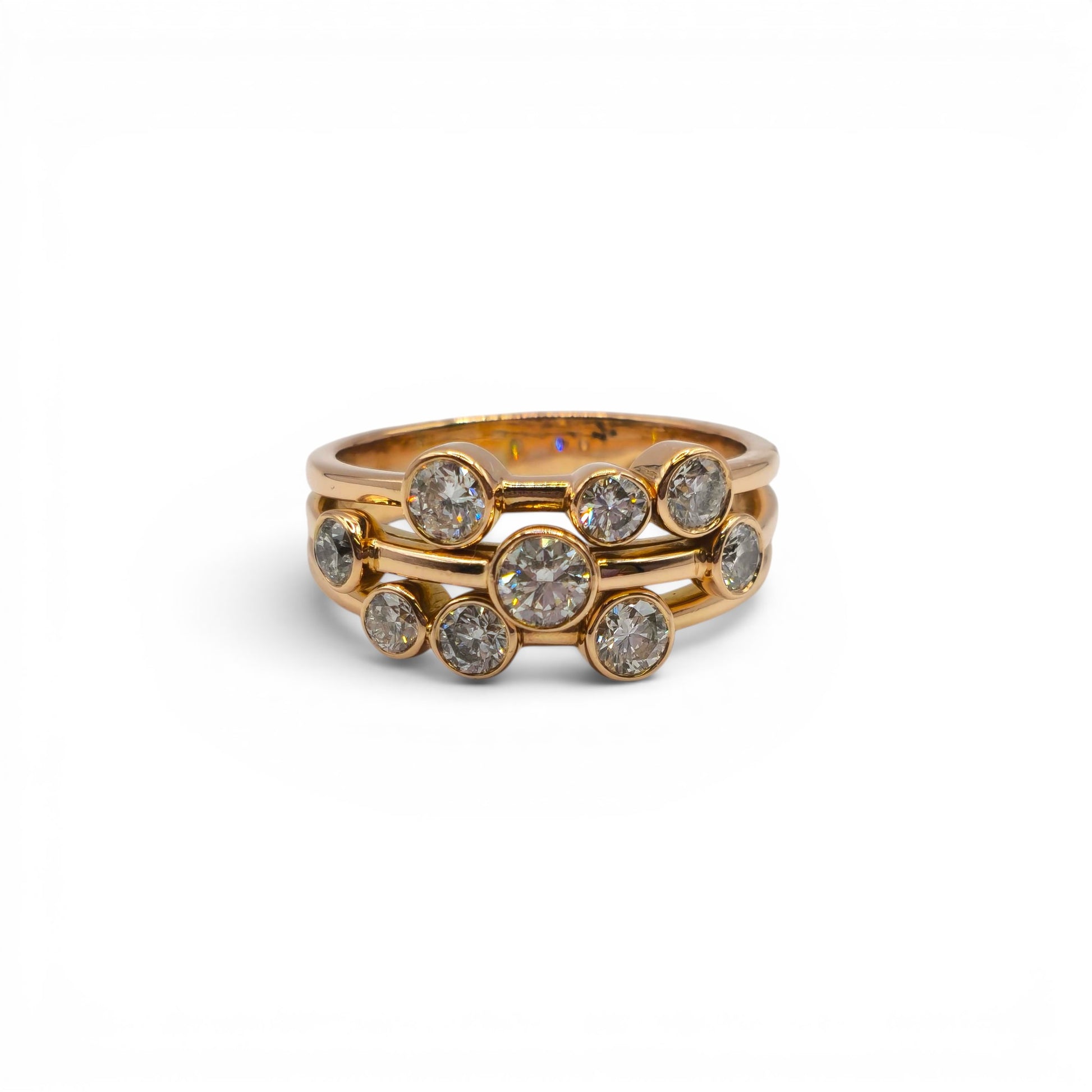 18ct rose gold diamond bubble ring by Reeves and Sons showcasing sparkling diamonds and a smooth, rounded design.