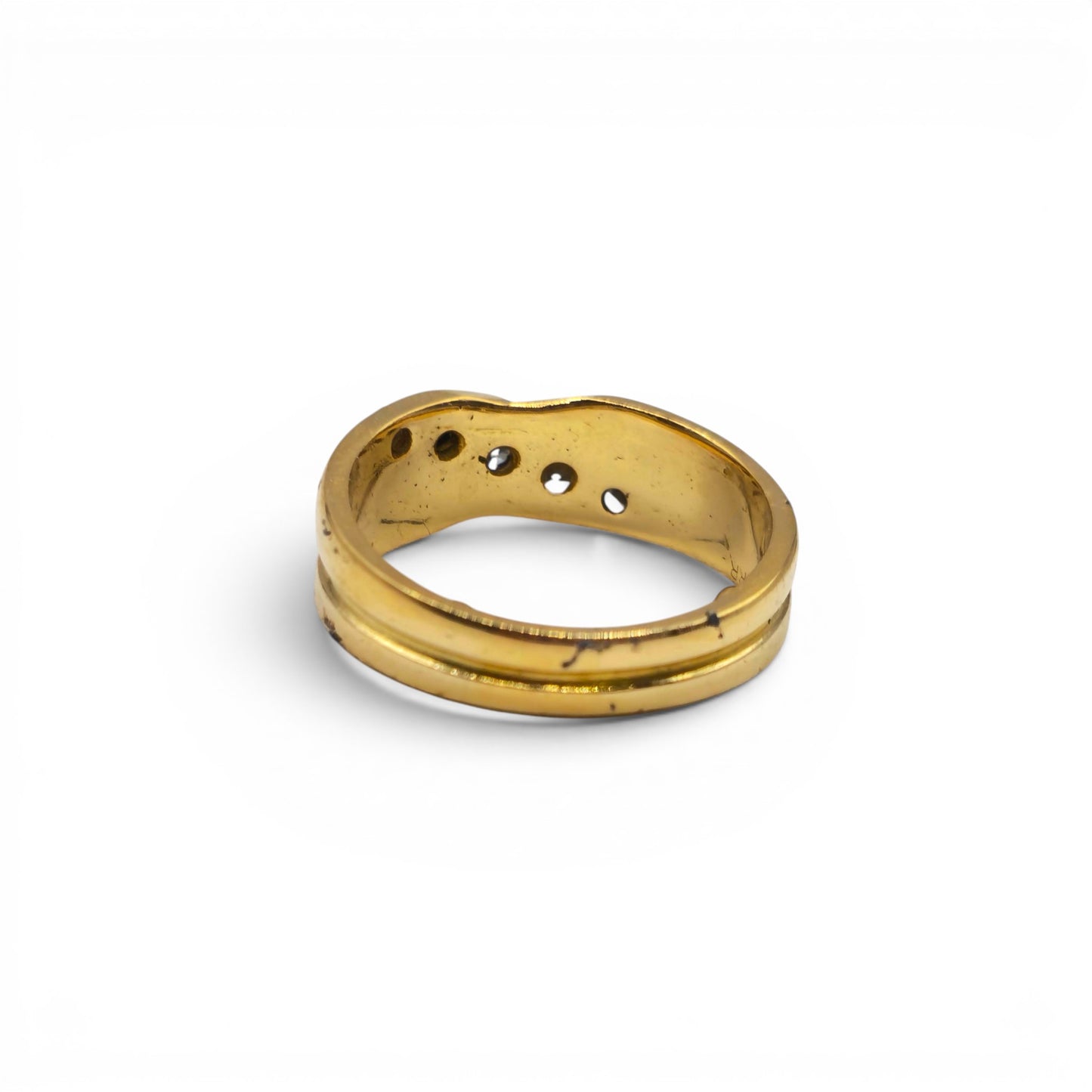 18ct yellow gold diamond crossover ring by Reeves and Sons, featuring sparkling diamonds and a sleek, elegant design.