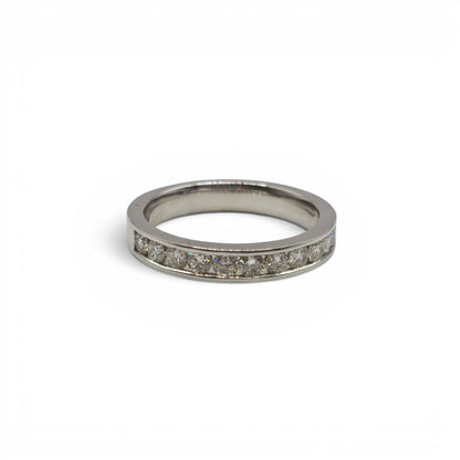 18ct white gold diamond half eternity ring with sparkling diamonds, featuring a sleek band design by Reeves and Sons.