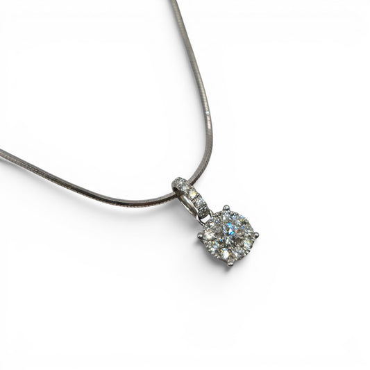18ct white gold diamond cluster pendant and chain, Reeves and Sons jewelry, featuring a sparkling diamond design.
