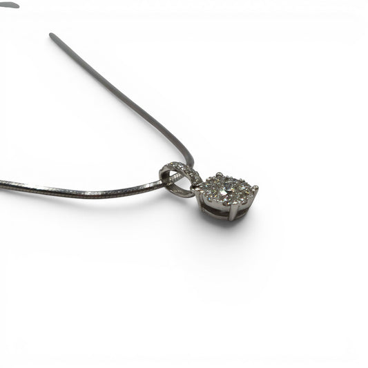 18ct white gold diamond cluster pendant with chain by Reeves and Sons, featuring sparkling diamond details and intricate design.