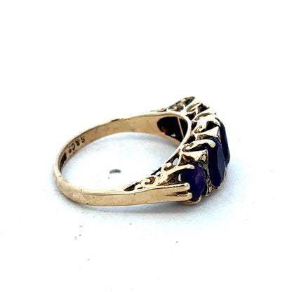 9ct yellow gold amethyst ring in size N with a polished gemstone and gold band, designed by Reeves and Sons.
