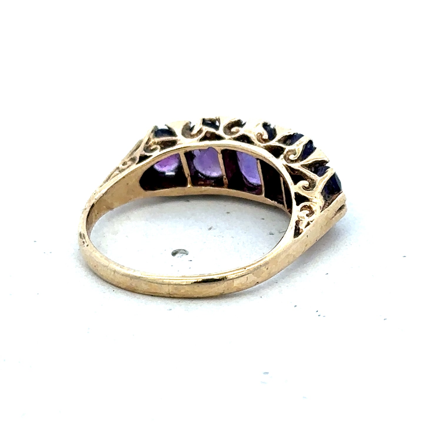 9ct yellow gold amethyst ring in size N with a round purple gemstone, crafted by Reeves and Sons.