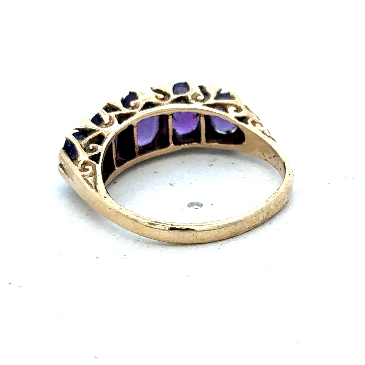 9ct yellow gold amethyst ring in size N with a large oval purple gemstone and gold band, crafted by Reeves and Sons.