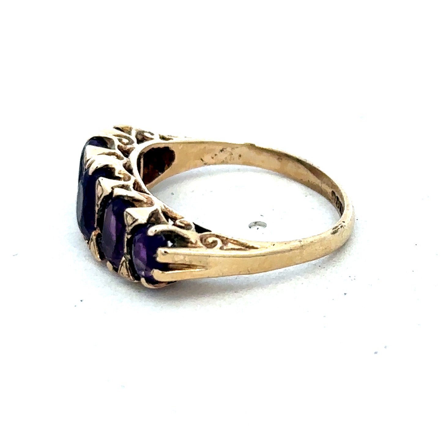 9ct yellow gold amethyst ring with oval gemstone set in a Reeves and Sons jewelry design, size N.