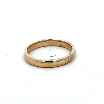 9ct yellow gold ring in size N with a smooth band, crafted by Reeves and Sons, displayed on a neutral background.