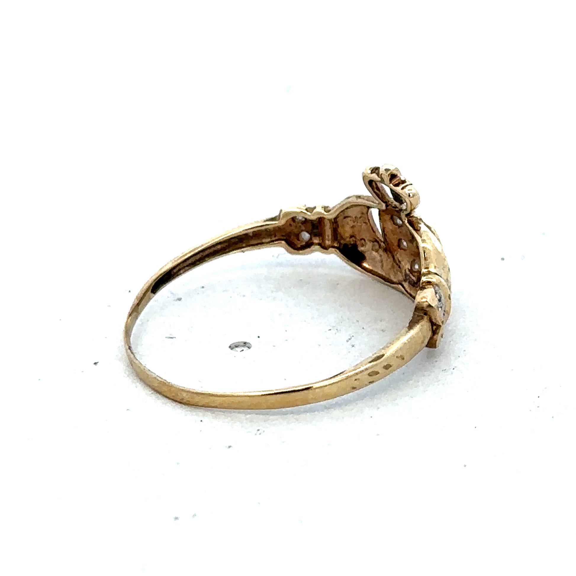 9ct yellow gold Claddagh ring in size V with detailed heart and hands design, crafted by Reeves and Sons.