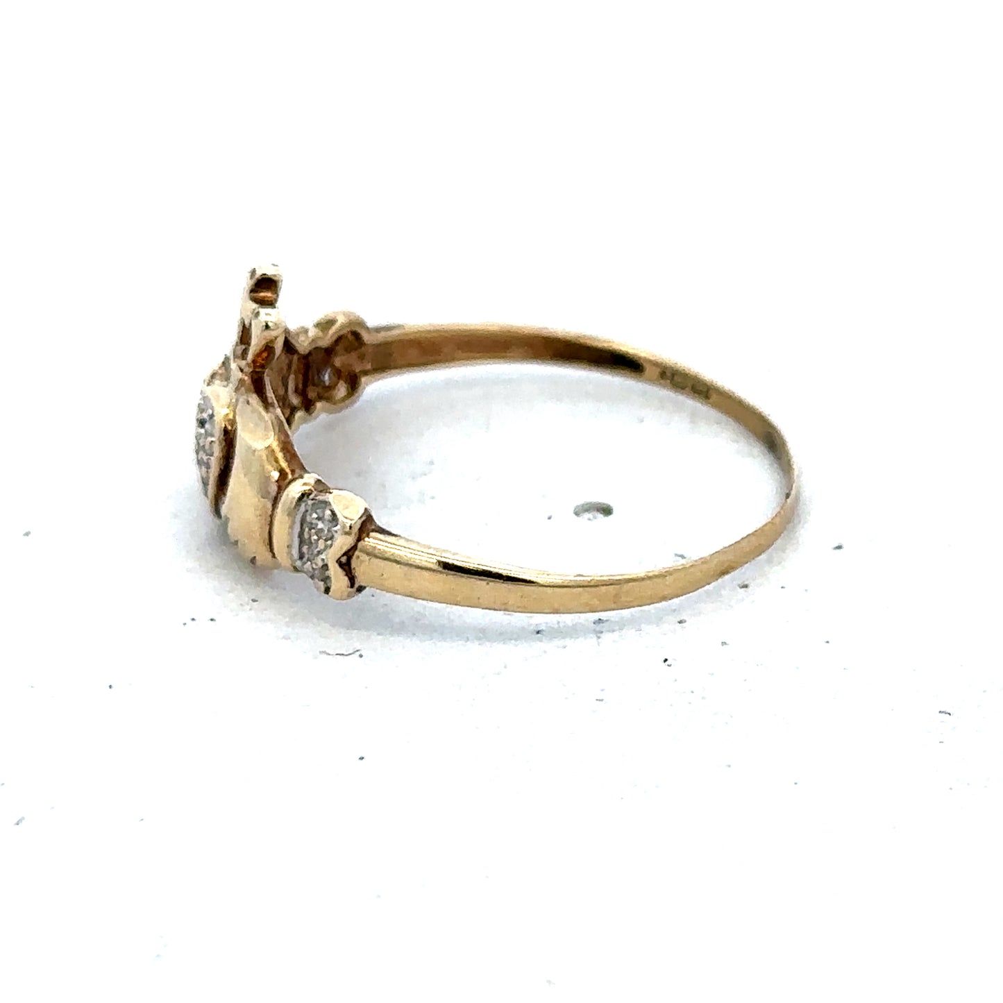 9ct yellow gold Claddagh ring in size V with detailed Celtic design, crafted by Reeves and Sons.